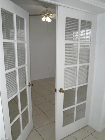 Double french doors to the den. Large enough to be a 4th bedroom. 12x10.75 ft.