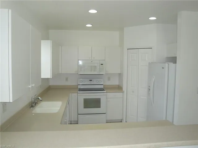 Lots of counter top and cabinet space.