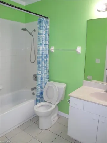 Guest bathroom with tub and shower.
