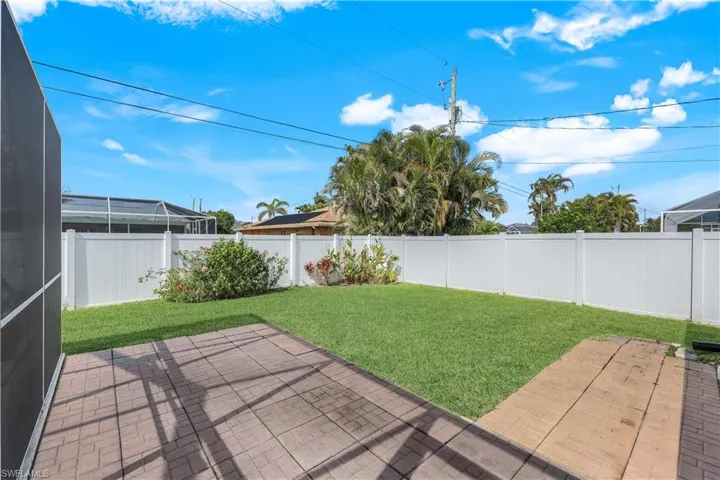View of yard with a patio