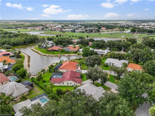 Aerial view of residential area with a large body of water