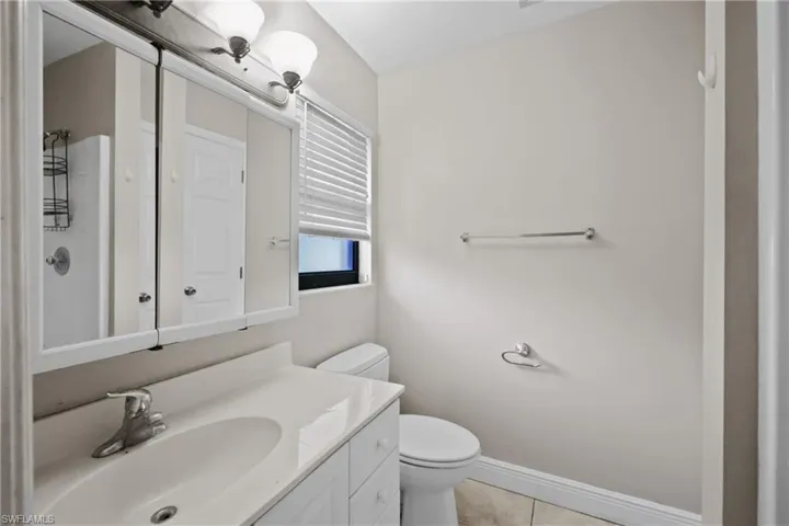 Bathroom featuring vanity and tile patterned flooring