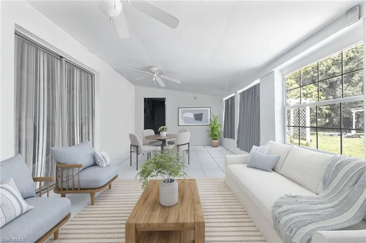 Sunroom with vaulted ceiling