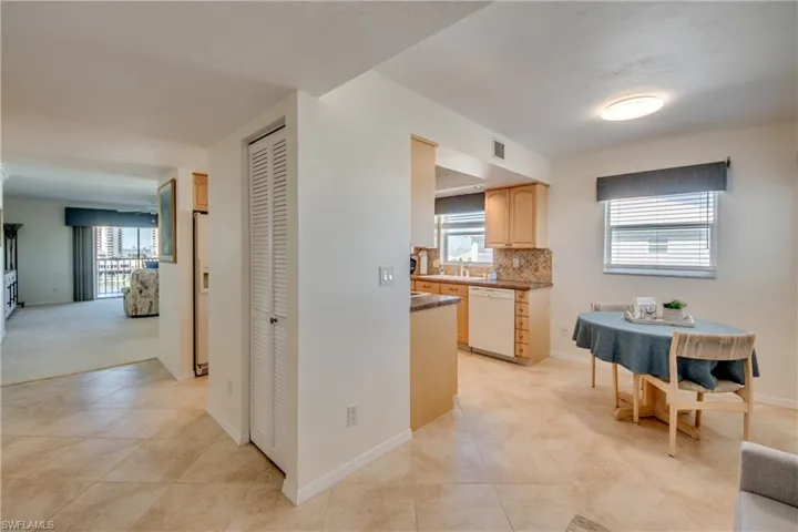Front door view eat in kitchen , and kitchen