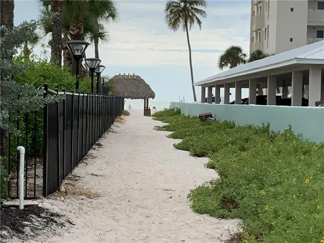 Beach access for community has a tiki hut on the beach