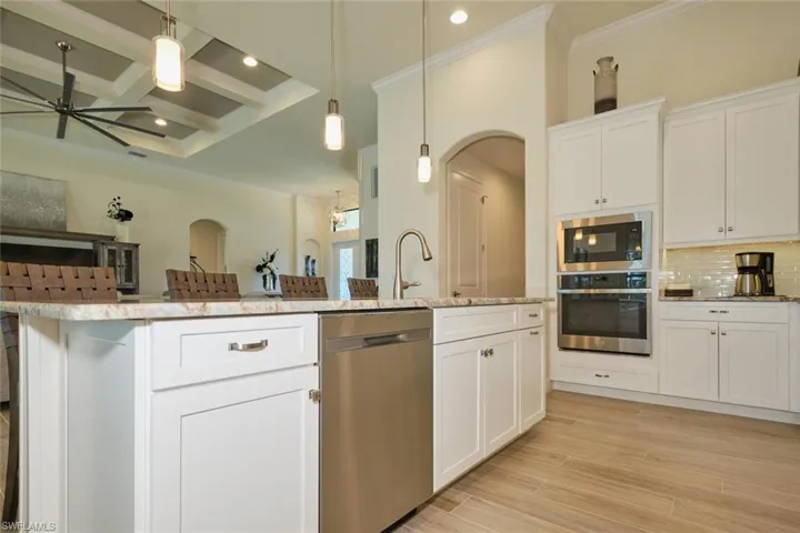 Featuring granite counters, stainless steel appliances, built-in range and Micro
