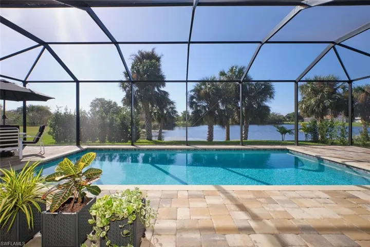 Gorgeous Pool, paver deck and view of pond