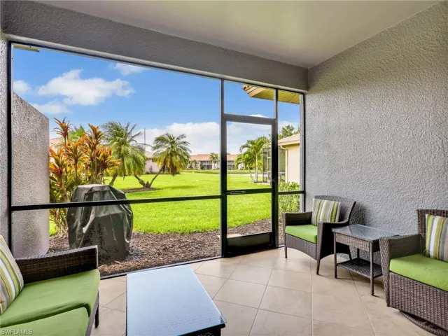 Screened-In Lanai with Tile Flooring on the Diagonal & Landscaped & Lake Views