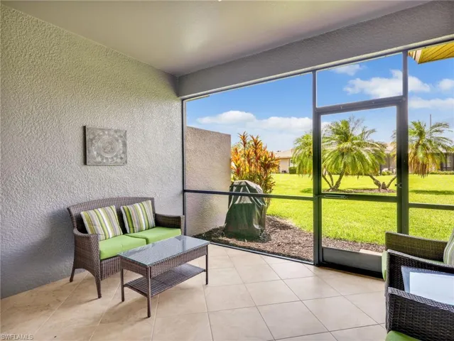 Screened-In Lanai with Tile Flooring on the Diagonal & Landscaped & Lake Views