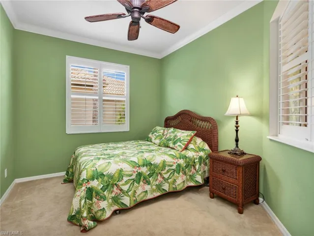 Den/Flex Area with Crown Molding & Plantation Shutters (Currently Used as a Third Bedroom)