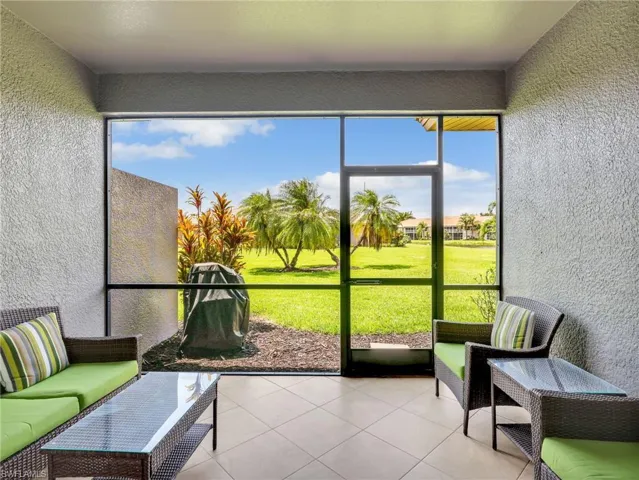 Screened In-Lanai with Tile Flooring on the Diagonal & Landscaped & Lake Views