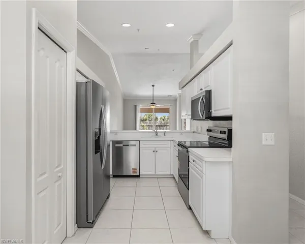 Kitchen With Brand New SS Whirlpool Appliances