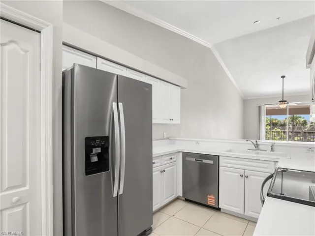 Kitchen With Brand New SS Whirlpool Appliances