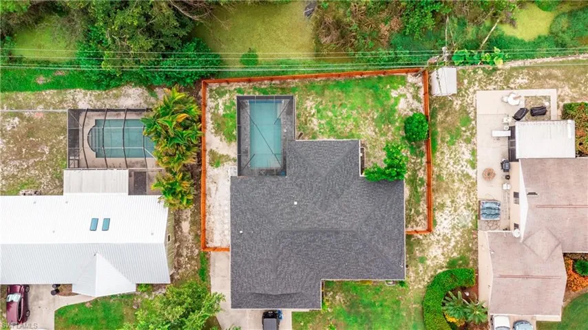 Aerial overview of property's location with property parcel outlined
