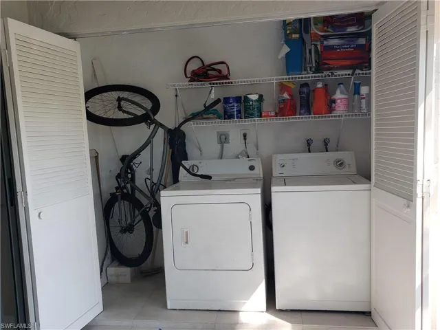 Laundry area with laundry area and separate washer and dryer