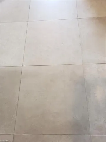 View of large format tile throughout condo