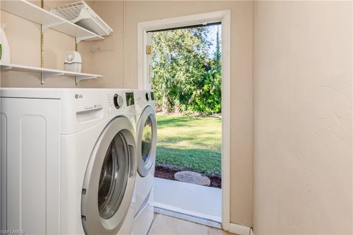 Laundry area featuring separate washer and dryer
