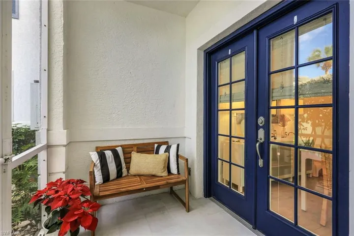 Balcony featuring french doors