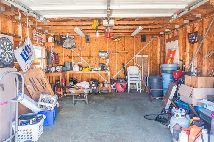 Garage featuring a garage door opener
