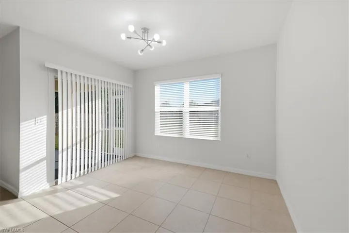 Neutral-toned tile flooring throughout