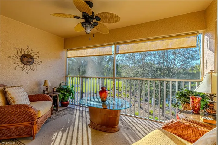 Sunroom / solarium featuring plenty of natural light and ceiling fan for those gorgeous Sunsets