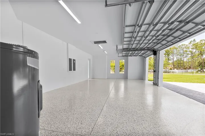 Garage featuring water heater