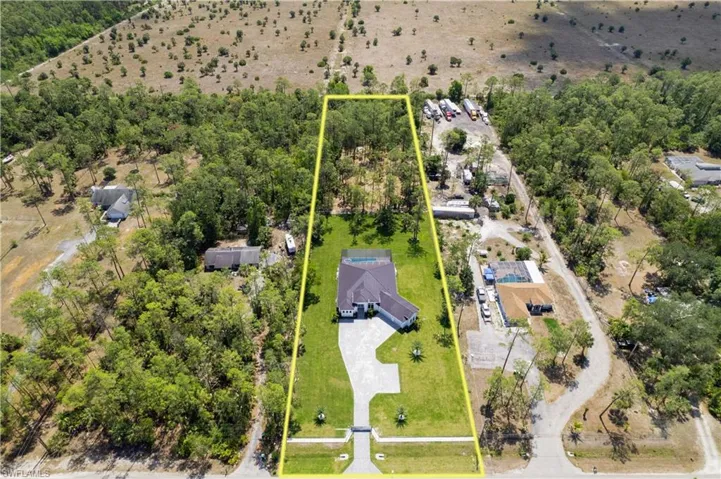 Aerial overview of property's location featuring property parcel outlined