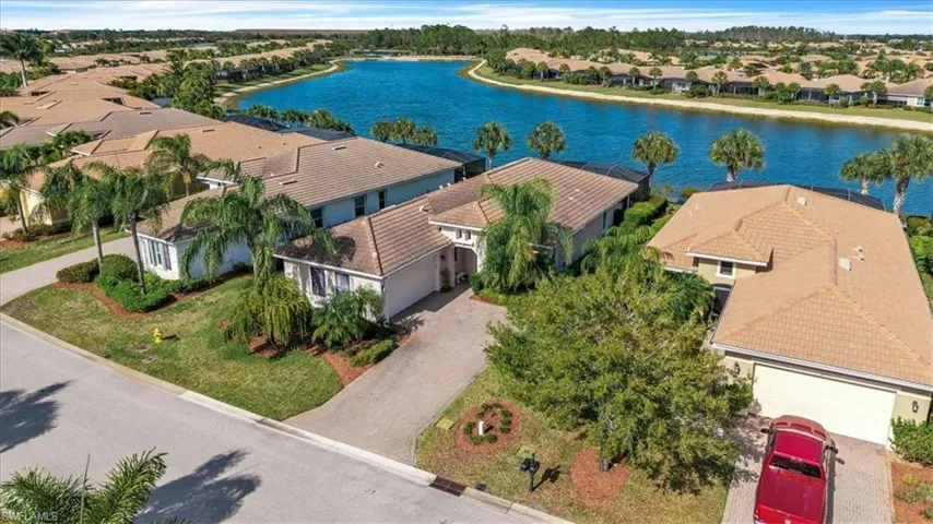 Aerial view of residential area with a nearby body of water