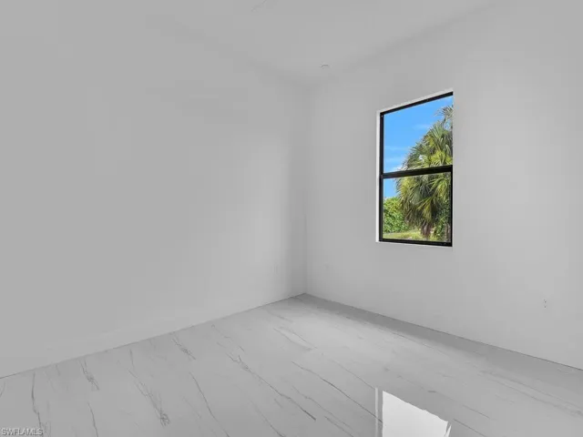 Spare room with light hardwood / wood-style floors