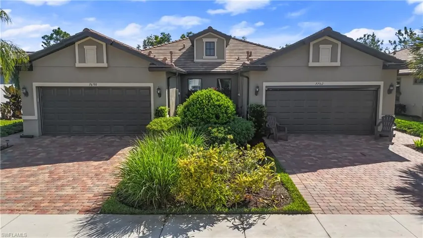 View of front of home featuring a garage