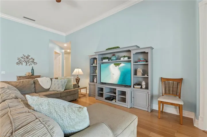 28100 Cetation Way Bonita Springs FL - Family room with crown moulding