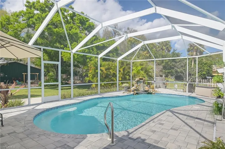 Heated (solar and gas) custom salt water pool with waterfall and pavers.  Lots of room for sunny and pool parties!