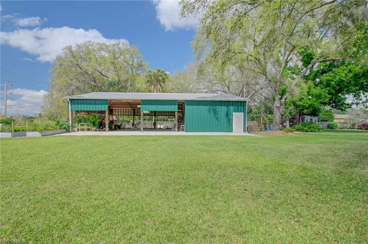 Big 60 x 40 barn features storage loft and two enclosed workshops/storage areas.  Tons of room for your boat, RV, farm equipment and toys.