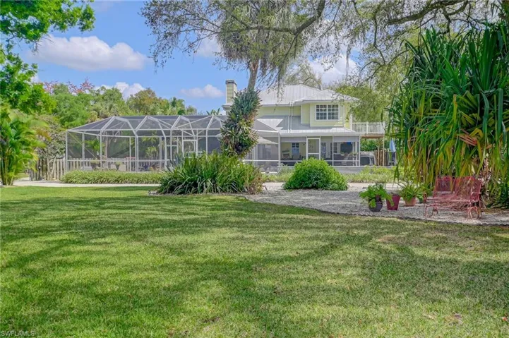 View from the yard of the back of this sprawling outdoor area.