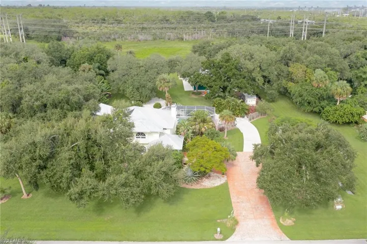 Areial view showing the entire 2.4 acres with lots of trees and open space to enjoy.
