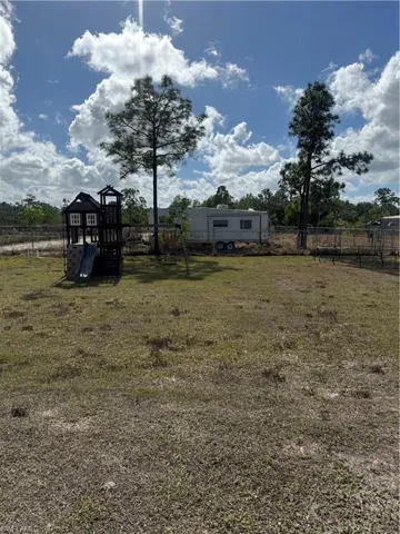 View of yard with a playground