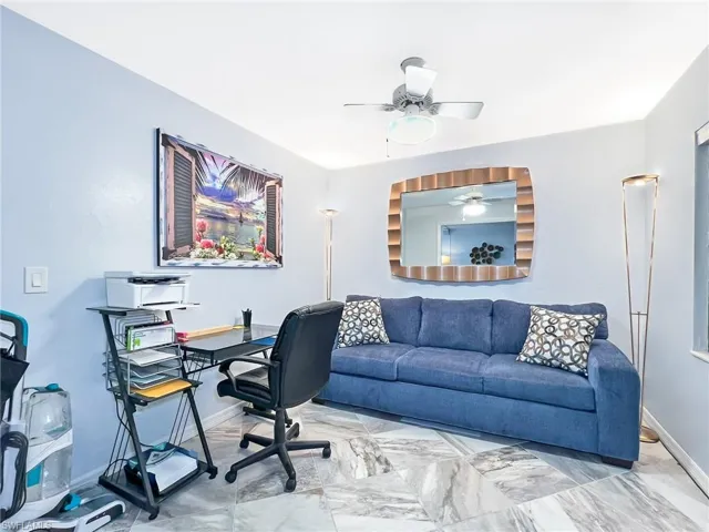 Office area featuring ceiling fan