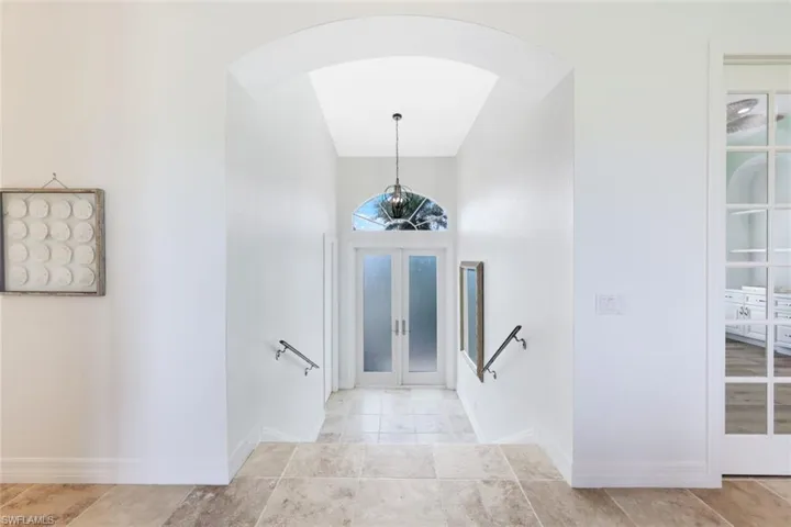 Entryway featuring light tile patterned flooring