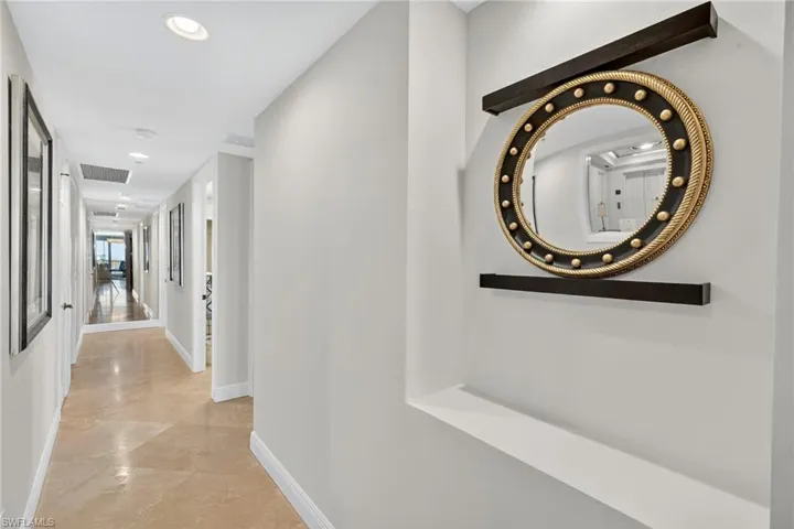 Hallway to two guest bedrooms & bathrooms