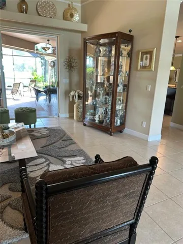 Living room featuring light tile patterned floors