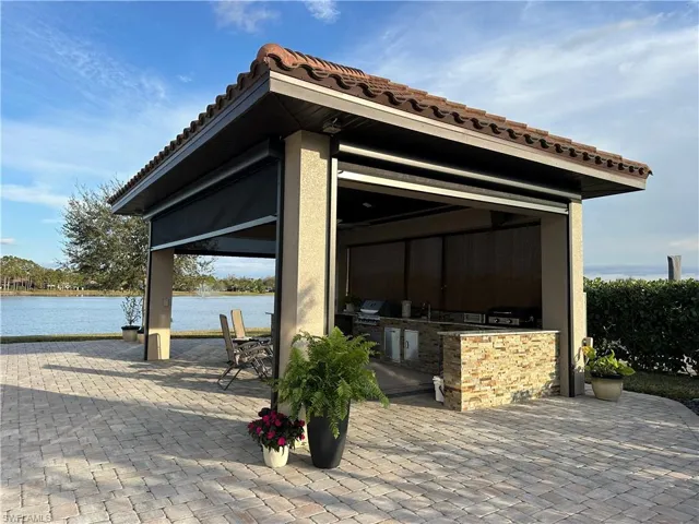 Garage featuring sink and a water view