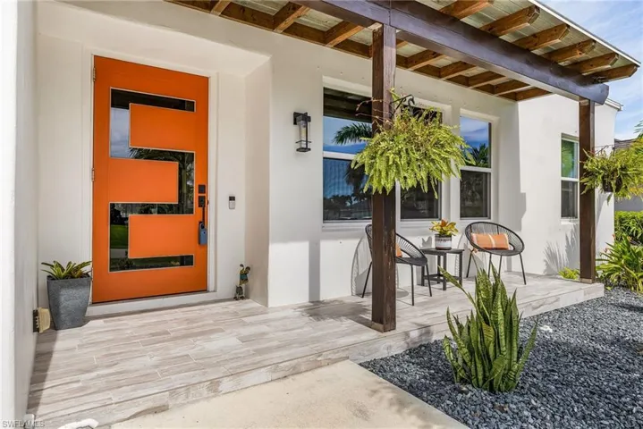 Entrance to property with a patio area