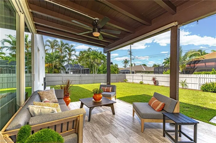 View of patio / terrace featuring an outdoor living space and ceiling fan