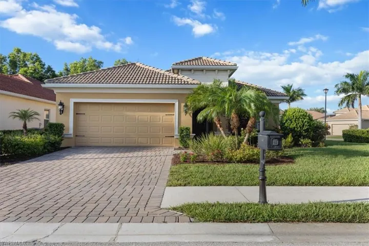 Large single family home built by Neal Communities in 2017, freshly landscaped, 2 car garage and paved driveway.