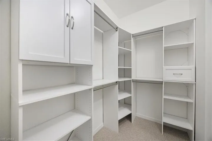 1 of 2 closets, this one with custom built ins