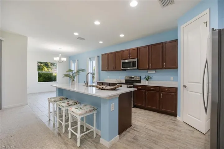 recessed lighting and plenty of windows makes this space light and bright