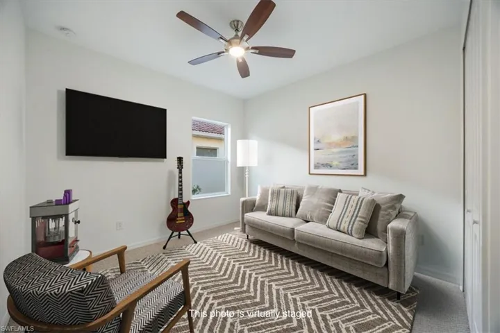 virtually imagined as a media room, the couch can pull out for guests.  A get away from the main living room, you have options!