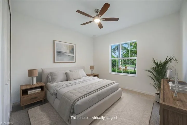 Virtually imagined as a guest bedroom, a queen comfy bed and dresser is all you need to welcome friends and family to your home