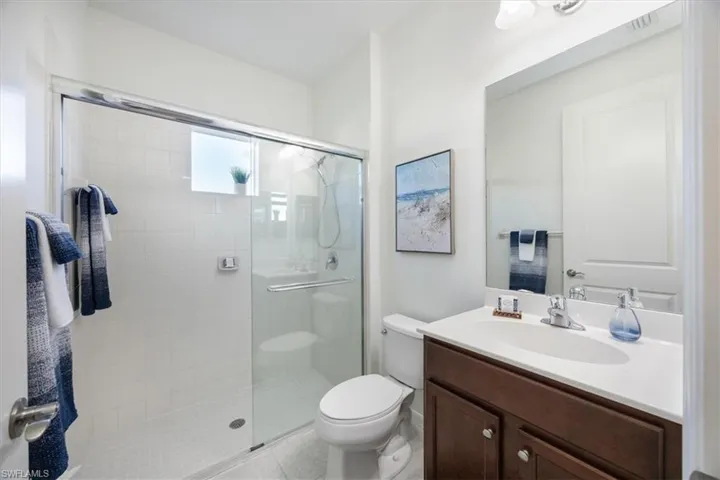 This bathroom is ideal for guest next to guest room, with a shower and glass door it is very functional, clean, light and bright
