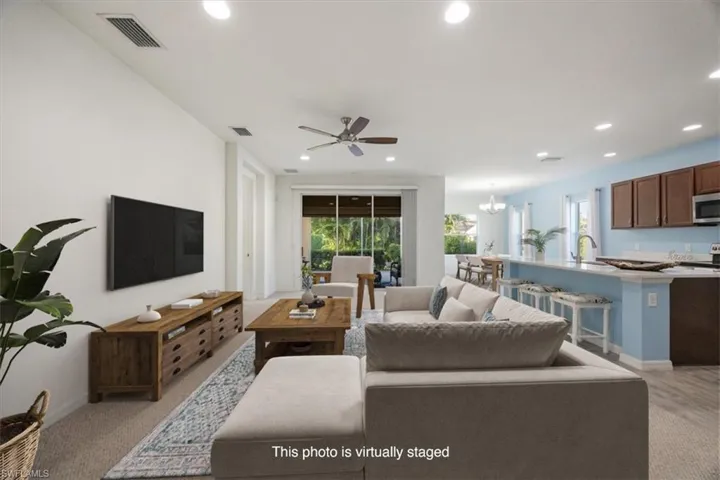 Virtually staged, plenty of room for a deep comfy sectional sofa, big TV and room for the whole family